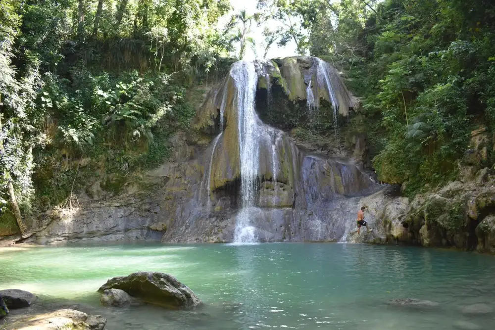 Calm shallow pool at the lower falls of Gozalandia Waterfall Puerto Rico, the family side for kids